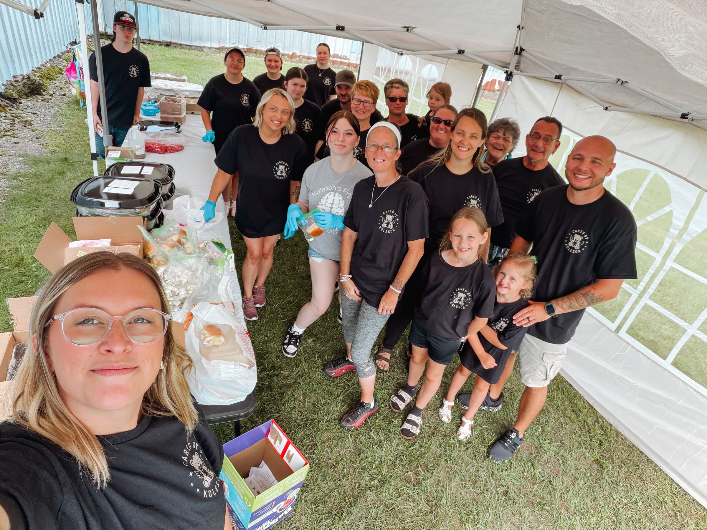 The full volunteer team gathered under the tent at the Chiavetta's Chicken BBQ